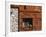 A Rich Wooden Wall with Rustic Tools and Window and a Stone Wall-null-Framed Photographic Print