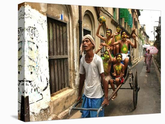 A Rickshaw Puller Carries Supporters of Brazil Soccer Team-null-Stretched Canvas