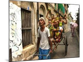 A Rickshaw Puller Carries Supporters of Brazil Soccer Team-null-Mounted Photographic Print