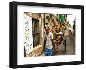 A Rickshaw Puller Carries Supporters of Brazil Soccer Team-null-Framed Photographic Print