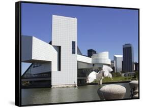 A Ring-Billed Gull Takes Flight in Front of the Rock and Roll Hall of Fame and Museum-null-Framed Stretched Canvas