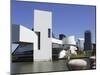 A Ring-Billed Gull Takes Flight in Front of the Rock and Roll Hall of Fame and Museum-null-Mounted Premium Photographic Print