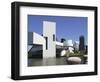 A Ring-Billed Gull Takes Flight in Front of the Rock and Roll Hall of Fame and Museum-null-Framed Photographic Print
