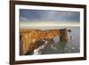 A rock arch on Dyrholaey Island seen in sunset sunlight, near Vik, south coast of Iceland-Nigel Hicks-Framed Photographic Print