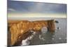 A rock arch on Dyrholaey Island seen in sunset sunlight, near Vik, south coast of Iceland-Nigel Hicks-Mounted Photographic Print