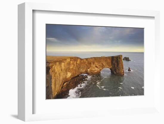 A rock arch on Dyrholaey Island seen in sunset sunlight, near Vik, south coast of Iceland-Nigel Hicks-Framed Photographic Print