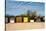 A Row of Beach Changing Huts-Will Wilkinson-Stretched Canvas