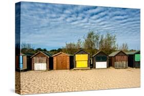 A Row of Beach Changing Huts-Will Wilkinson-Stretched Canvas