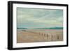 A Row of Wooden Posts on a Beach-Clive Nolan-Framed Photographic Print