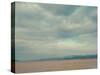 A Row of Wooden Posts on a Beach-Clive Nolan-Stretched Canvas