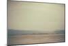 A Row of Wooden Posts on a Beach-Clive Nolan-Mounted Photographic Print