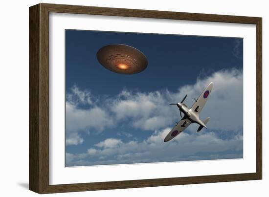 A Royal Air Force Supermarine Spitfire Aircraft Giving Chase to a Ufo-null-Framed Art Print