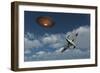 A Royal Air Force Supermarine Spitfire Aircraft Giving Chase to a Ufo-null-Framed Art Print