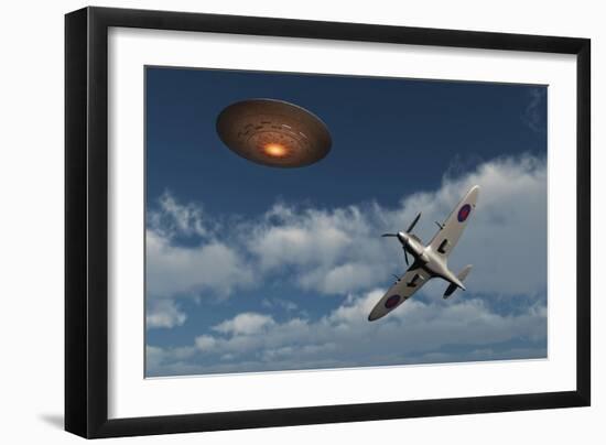 A Royal Air Force Supermarine Spitfire Aircraft Giving Chase to a Ufo-null-Framed Art Print