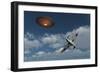 A Royal Air Force Supermarine Spitfire Aircraft Giving Chase to a Ufo-null-Framed Art Print