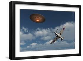 A Royal Air Force Supermarine Spitfire Aircraft Giving Chase to a Ufo-null-Framed Art Print