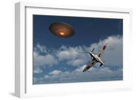 A Royal Air Force Supermarine Spitfire Aircraft Giving Chase to a Ufo-null-Framed Art Print