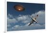 A Royal Air Force Supermarine Spitfire Aircraft Giving Chase to a Ufo-null-Framed Art Print