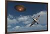 A Royal Air Force Supermarine Spitfire Aircraft Giving Chase to a Ufo-null-Framed Art Print