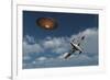 A Royal Air Force Supermarine Spitfire Aircraft Giving Chase to a Ufo-null-Framed Art Print