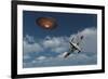 A Royal Air Force Supermarine Spitfire Aircraft Giving Chase to a Ufo-null-Framed Art Print