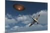 A Royal Air Force Supermarine Spitfire Aircraft Giving Chase to a Ufo-null-Mounted Art Print