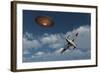 A Royal Air Force Supermarine Spitfire Aircraft Giving Chase to a Ufo-null-Framed Art Print