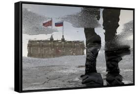 A Russian Police Officer Stands-Alexander Demianchukr-Framed Stretched Canvas