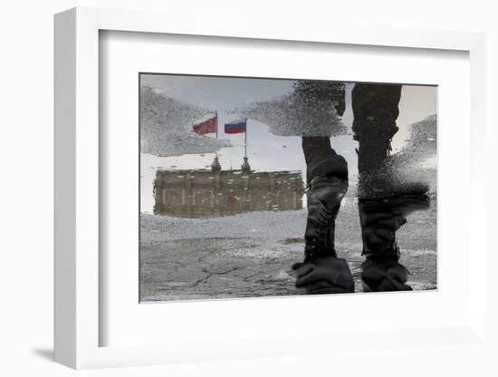 A Russian Police Officer Stands-Alexander Demianchukr-Framed Photographic Print