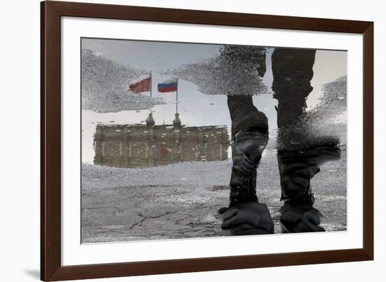 A Russian Police Officer Stands-Alexander Demianchukr-Framed Photographic Print