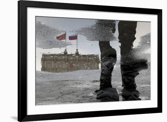 A Russian Police Officer Stands-Alexander Demianchukr-Framed Photographic Print