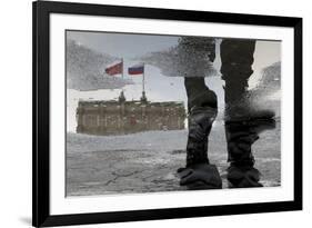 A Russian Police Officer Stands-Alexander Demianchukr-Framed Photographic Print