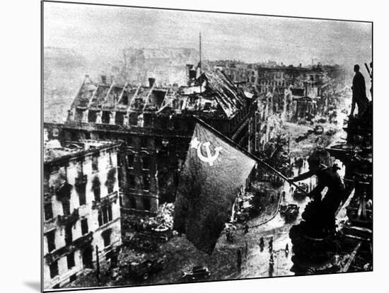 A Russian Sergeant Raises the Soviet Flag over the Reichstag, Berlin, 1945-null-Mounted Photographic Print