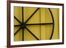 A Rusty Wheel from a Deck Is Nailed to an Outdoor Wall in Key West, Florida-Sergio Ballivian-Framed Photographic Print