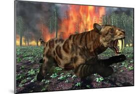 A Saber-Toothed Tiger Running Away from a Forest Fire-null-Mounted Art Print