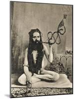A Sadhu Smoking a Remarkable Pipe, India-null-Mounted Photographic Print