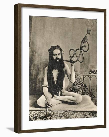 A Sadhu Smoking a Remarkable Pipe, India-null-Framed Photographic Print