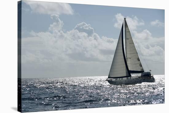 A Sailboat in the Caribbean.-Gary Blakeley-Stretched Canvas