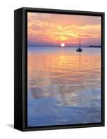 A Sailboat Silhouetted against a Brilliant Sunset in a Cove off Pensacola Bay, Florida-Colin D Young-Framed Stretched Canvas