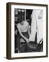 A Sailor in the Tailor Shop Aboard a US Navy Cruiser Checking Uniform Trousers of Another Sailor-null-Framed Photographic Print