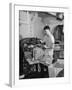 A Sailor Pressing Uniform Trousers in the Tailor Shop of a US Navy Cruiser-null-Framed Photographic Print