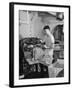 A Sailor Pressing Uniform Trousers in the Tailor Shop of a US Navy Cruiser-null-Framed Photographic Print