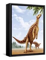 A Scelidosaurus Standing on its Hind Legs Eating Conifer Leaves-null-Framed Stretched Canvas