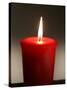 A Scented Votive Candle Burns-null-Stretched Canvas