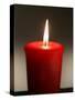 A Scented Votive Candle Burns-null-Stretched Canvas