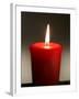 A Scented Votive Candle Burns-null-Framed Photographic Print