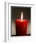 A Scented Votive Candle Burns-null-Framed Photographic Print