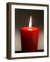 A Scented Votive Candle Burns-null-Framed Photographic Print