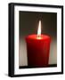 A Scented Votive Candle Burns-null-Framed Photographic Print