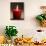 A Scented Votive Candle Burns-null-Photographic Print displayed on a wall